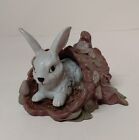 Ceramic Bunny Rabbit Nesting in a Log Figurine 