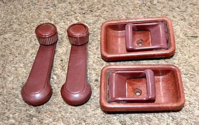 1986-1993 MAZDA B2200 B2600 DOOR PANEL TRIM HANLE BEZEL CRANKS MAROON AUTHENTIC - Image 1 of 4