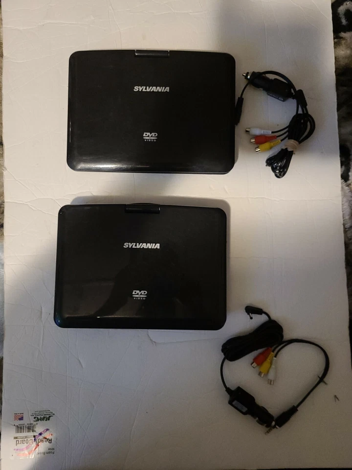 Sylvania SDVD9020B Blue 9" Portable Swivel Screen DVD Player 2 both Work Great - Image 1 of 4