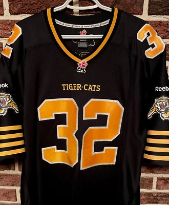 ¡IMPRESIONANTE! Camiseta deportiva Reebok Hamilton Tiger Cats #32 CJ GABLE CFL para hombre 2XL Ti-Cats ¡EXCELENTE! Foto 1 de 4