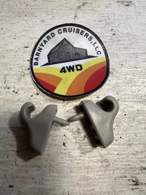 Toyota Land Cruiser 1987 1990 FJ60 FJ62 parasol izquierdo y derecho clips Foto 1 de 4