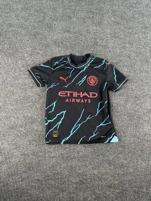 Camiseta deportiva Man City De Bruyne 17 Puma niños tercera equipación juvenil pequeña negra eléctrica Foto 1 de 4