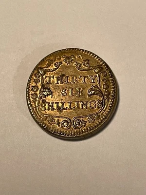 Moneda británica de latón 36 chelines peso de la década de 1700 Foto 1 de 2