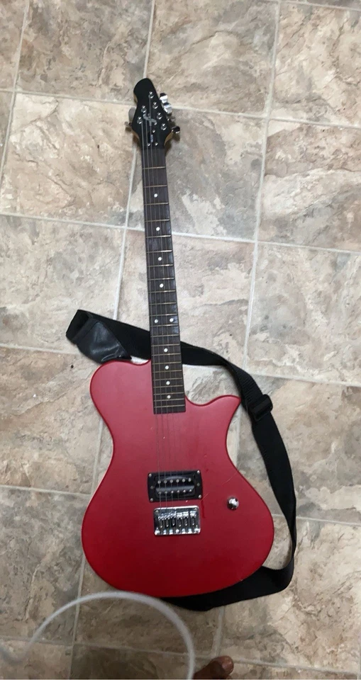 Guitarra eléctrica roja sin cuerdas sólida Foto 1 de 1