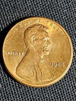 Penny Errors 1984 sin marca de ceca, golpeado fuera del centro, (XF) Foto 1 de 4