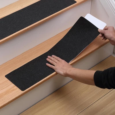 Paquete de 12 peldaños antideslizantes para escaleras exteriores - cinta adhesiva antideslizante de 6" X 24" Foto 1 de 4