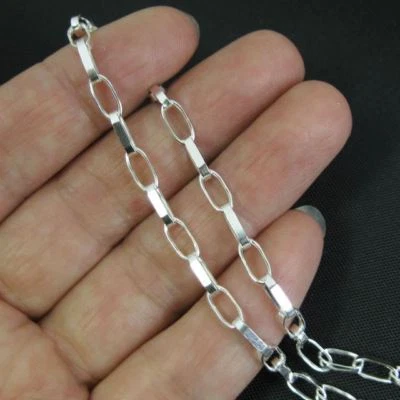 Cadena de plata esterlina para hacer joyas a granel por pie cadena Rolo ovalada plana 7,5X3 mm Foto 1 de 4