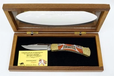Cuchillo de Bolsillo Plegable BUCK 110 Michael Prater Poni Pintado Rojo y Dorado con Caja y Certificado de Autenticidad Foto 1 de 4