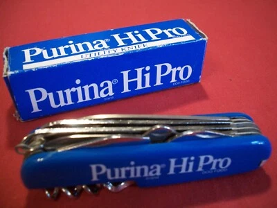 Faca Multi Ferramenta Publicitária Vintage Purina Hi Pro com 11 Lâminas, Nova Na Caixa Nos - Imagem 1 de 2