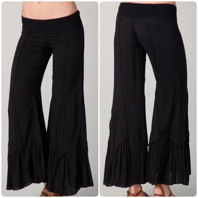 Pantalones acampanados Indah negros con volantes de pierna ancha para mujer talla S cintura ajustada boho chic Foto 1 de 4
