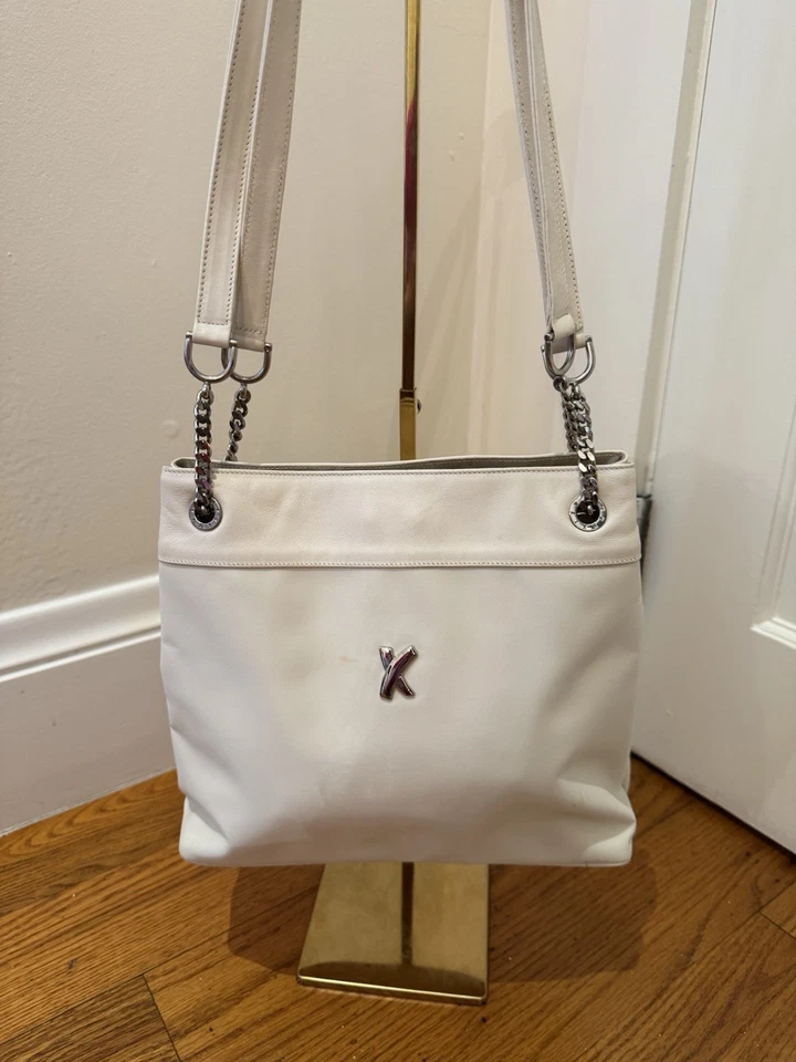 Bolso Paloma Picasso Lona Y Cuero Herrajes Plateados. Foto 1 de 4