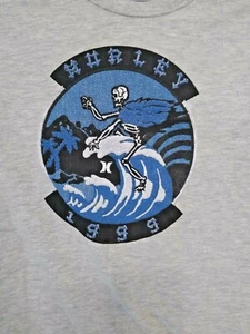 Hurley 1999 Graphic T Shirt Size XL 13-15 Yrs. Gray Cotton Skeleton On Wave Blue - Picture 1 of 8