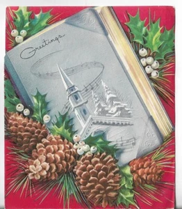TARJETA DE NAVIDAD DE COLECCIÓN 4,75X5,5 roja con libro azul piñones con iglesia - Imagen 1 de 3