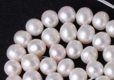 CUENTAS CULTIVADAS PERLAS DE AGUA DULCE BLANCAS CASI REDONDAS DE 8 MM-9 MM HEBRA 15 PULGADAS Foto 1 de 4