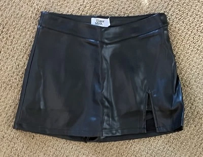 Minifalda de cuero de vinilo Tiger Mist para mujer talla XS negra con abertura  Foto 1 de 2