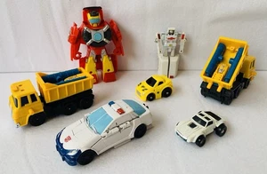 7x Vintage Transformer Toys, Inc Ambulance, Trucks, Police & Race Cars - GC - Picture 1 of 21