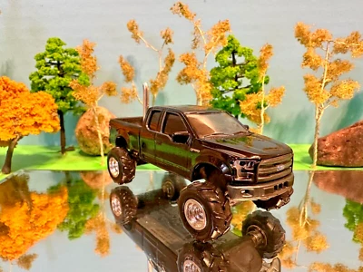 1/64 Custom Lifted 2015 Ford F-150, Rear Pipe, Extended Cab, G5 Lift Greenlight - Image 1 of 4