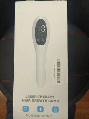 Peine para el crecimiento del cabello con terapia láser Foto 1 de 2