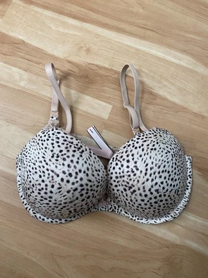 Victoria's Secret, Body by Victoria, Sujetador Acolchado Estampado Leopardo, Talla 36DD Foto 1 de 4