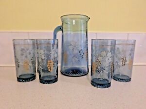 VINTAGE BLUE GLASS JUG WITH SIX MATCHING GLASSES VINTAGE BLUE GLASS JUG WITH SIX MATCHING GLASSES