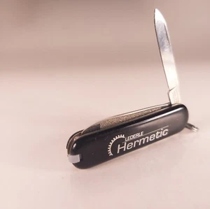 Navaja de Bolsillo LEDERLE HERMETIC Logo Victorinox Swiss Army Clásica Negra 58MM - Imagen 1 de 5