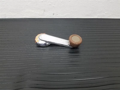 Manivela ventana delantera camioneta Nissan 86-93 carrocería rígida marrón OEM 80760-01G23 Foto 1 de 4