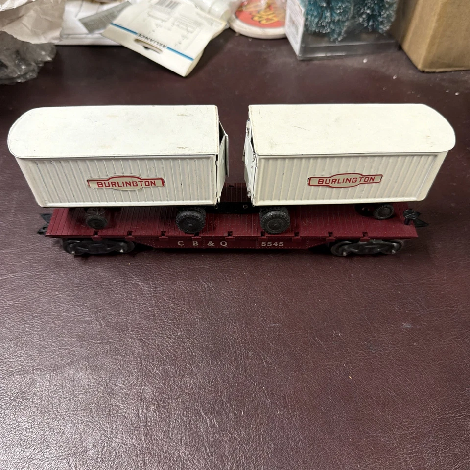 Coche plano Marx calibre O CB&Q 5545 con 2 remolques para camiones Burlington de hojalata Foto 1 de 4