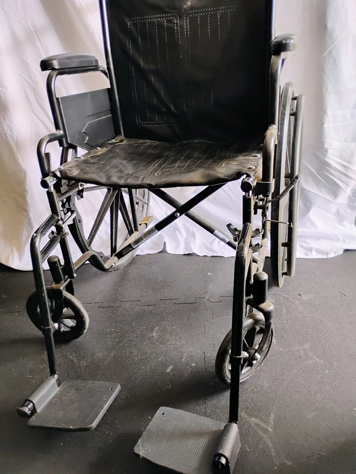 wheel chair collapsible black; fair condition  - Image 1 of 1