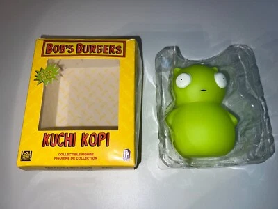 Figura Vinilo Oficial Bob's Burgers Kuchi Kopi Brilla en la Oscuridad 5" CAJA DAÑADA Foto 1 de 2