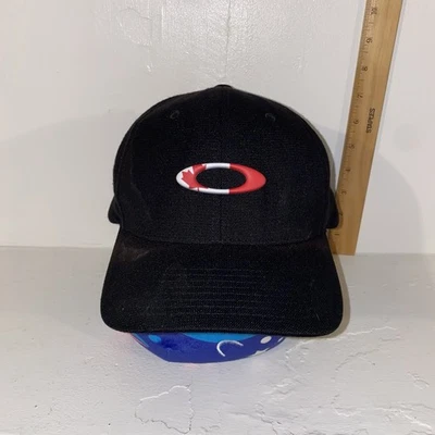 Gorra/Gorra de Béisbol Oakley Clásica Flexible Negra Bandera Canadiense Logo Elipse Talla L/XL Foto 1 de 4