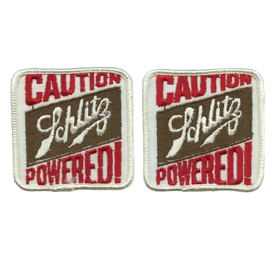 Lote de 2 parches originales de cerveza Schlitz de precaución vintage nuevos de colección Foto 1 de 3