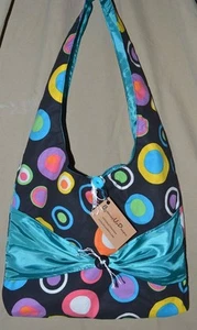 Borsa stile hobo a pois con disegni abbottonati - Foto 1 di 4