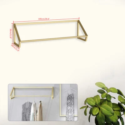 Estante de exhibición de ropa moderno montado en la pared estante de almacenamiento para tienda de ropa Foto 1 de 4