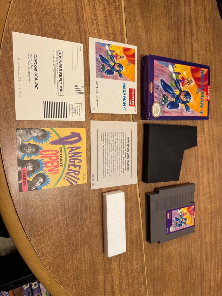 Mega Man 4 (Nintendo NES) MM MM4 CIB complete video game great shape Rockman - Image 1 of 4