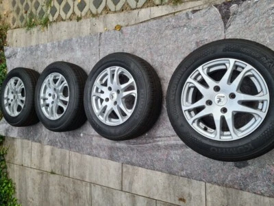 Neue Sommerreifen 185/65 R14 mit gebr. Alufelgen - Bild 1 von 4