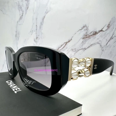 Gafas de sol CHANEL negras rectangulares polarizadas doradas transparentes perlas giratorias CC Chanel Foto 1 de 4