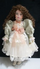Outstanding Porcelain Doll with beautiful long curly Dark Auburn Hair