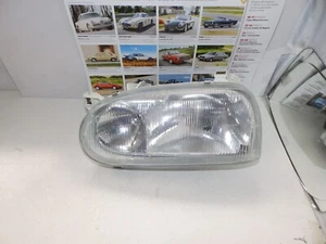 VOLKSWAGEN GOLF GTI. 91/ 97 - FARO SX DOPPIA PARABOLA ORIGINALE HELLA - Bild 1 von 3
