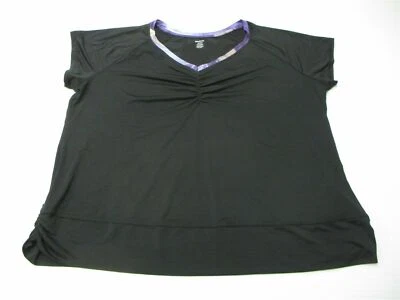 Camiseta de entrenamiento REEBOK para mujer talla 22/24 elástica negra/púrpura con cuello en V Foto 1 de 4