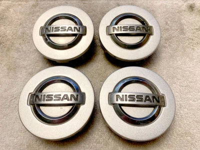 Tapacubos centrales Nissan Xterra 2005-2012 4 piezas OEM 40342-EA210 Armada Pathfinder Foto 1 de 4