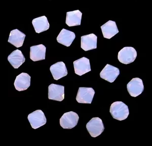 (24) 4 mm Swarovski Kristall Kegel - Violetter Opal - Bild 1 von 2
