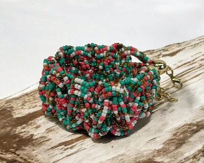 Pulsera trenzada hecha a mano de cuentas de vidrio Foto 1 de 4