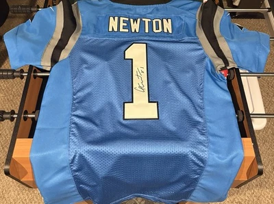 Cam Newton Nike Autographed Carolina Blue Panthers Jersey. MD. Never Worn - Image 1 of 4