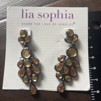 Bonitos pendientes colgantes Lia Sophia elegantes tono gris con cristales de color ámbar Foto 1 de 4