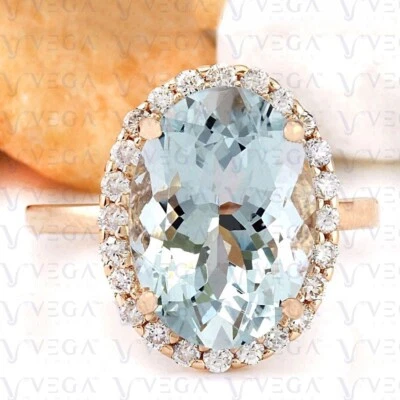 Alianza enchapada en oro rosa de 18 quilates y aguamarina natural de corte ovalado de 6,99 quilates Foto 1 de 4