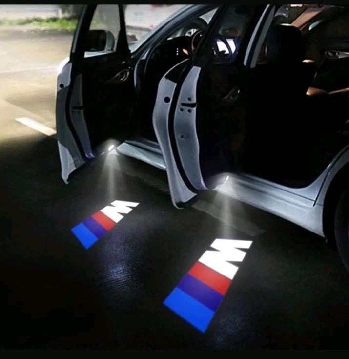 2 LUCI PROIETTORI LED SOTTO PORTA BMW SERIE 1,2,3,4,5,6,7,X1,X3,X4,X5,X6,X7 - Immagine 1 di 4
