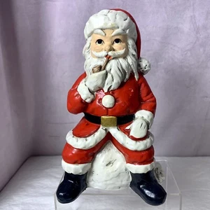 Figura de Papá Noel vintage con pipa sentada en saco de juguete Japón papel maché - Imagen 1 de 10