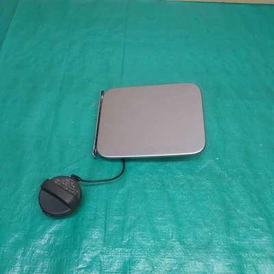 2012-2019 Nissan Versa Fuel Tank Door OEM  - Image 1 of 4