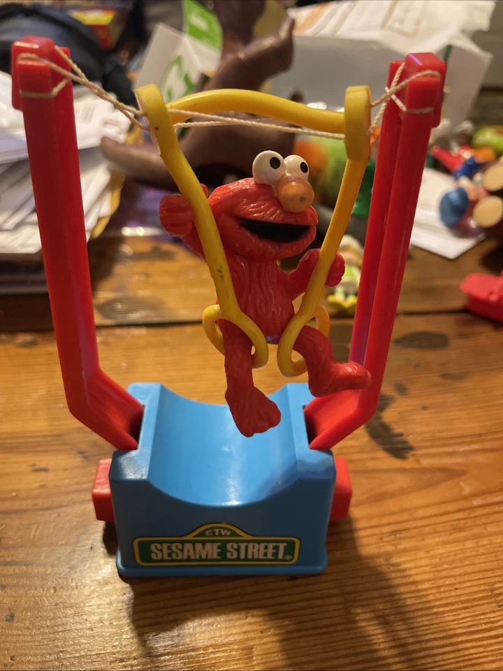 Brinquedo Elmo Sesame Street Squeeze And Swing Vintage Animal Fair - Imagem 1 de 1