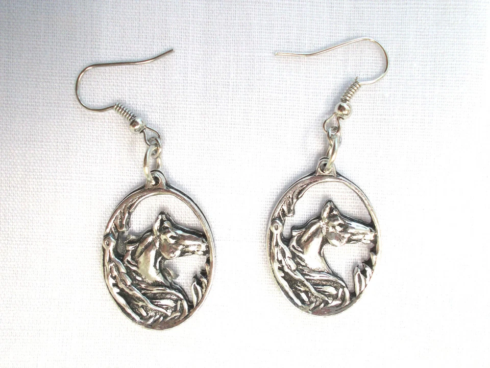 PONY HORSE HEAD with FEATHER DECO IN OVAL SHAPE DANGLING PEWTER PAIR EARRINGS - Image 1 of 1